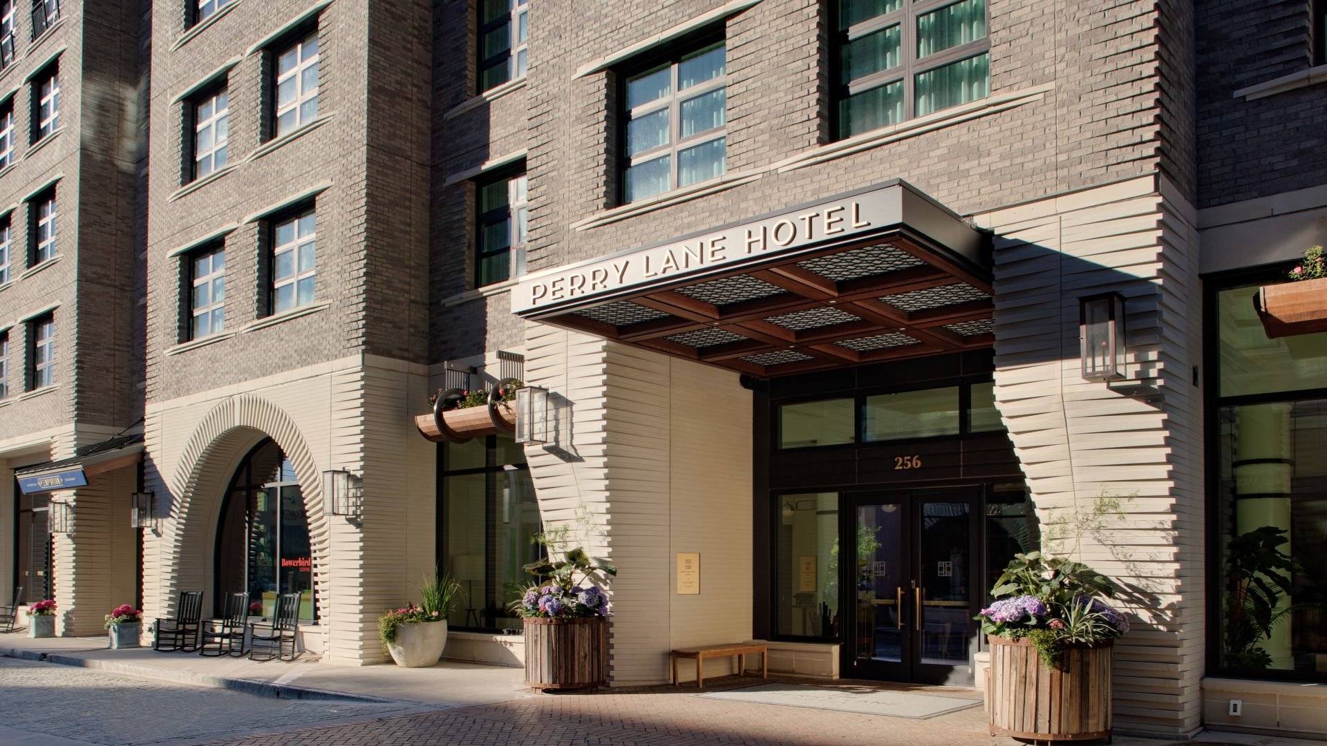 Perry Lane Hotel historic brick entrance with modern awning
